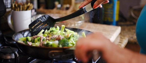 A photo of a stir fry being cooked in a frying pan